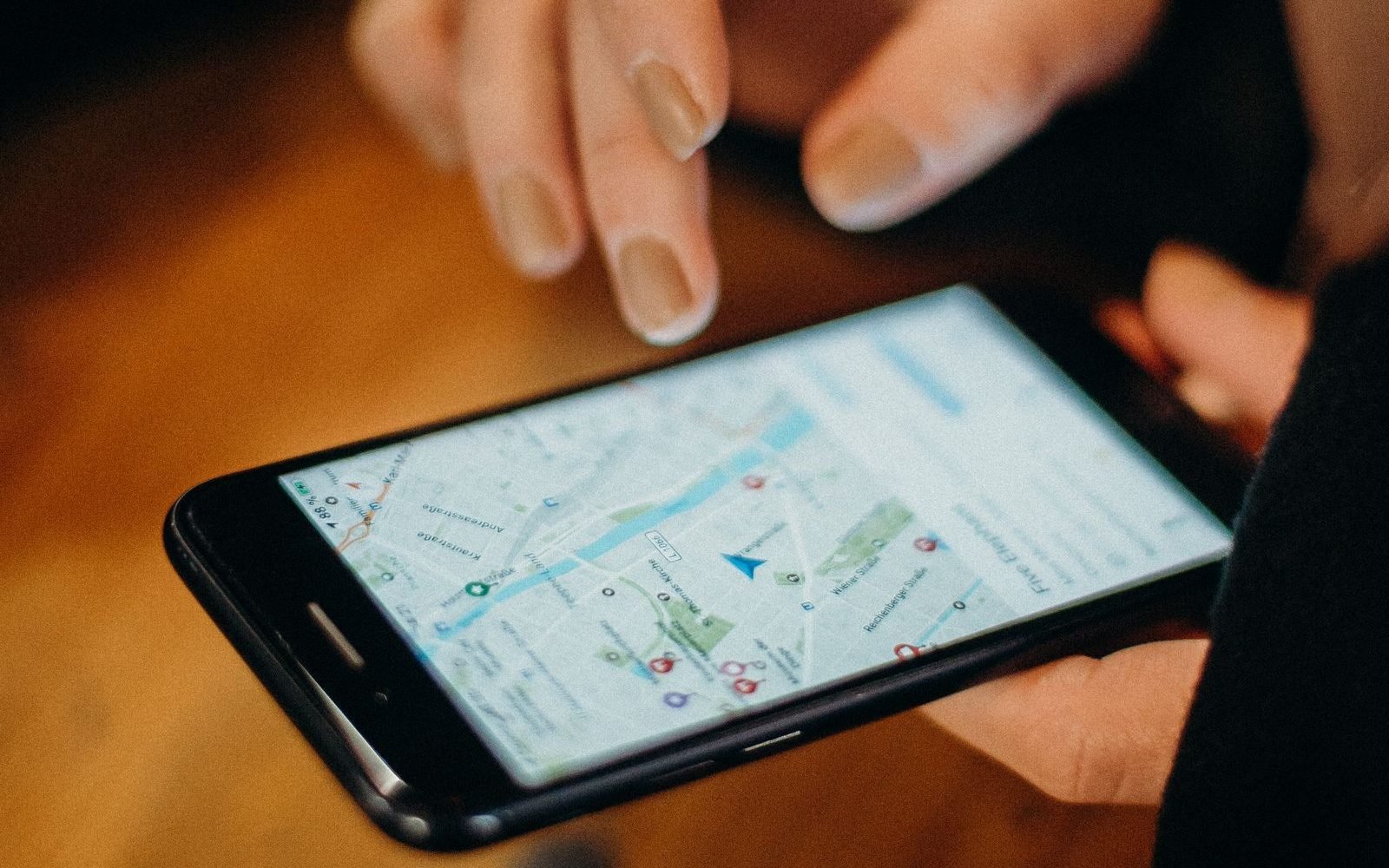 Person searching for a nearby business on a smartphone